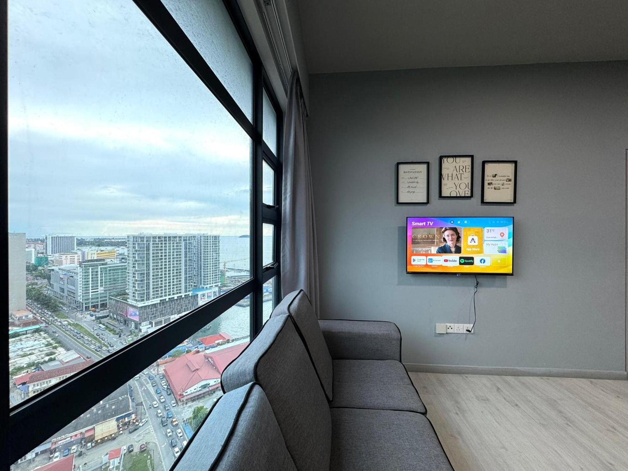 Sunset Seaview Vacation @ Jesselton Quay Apartment